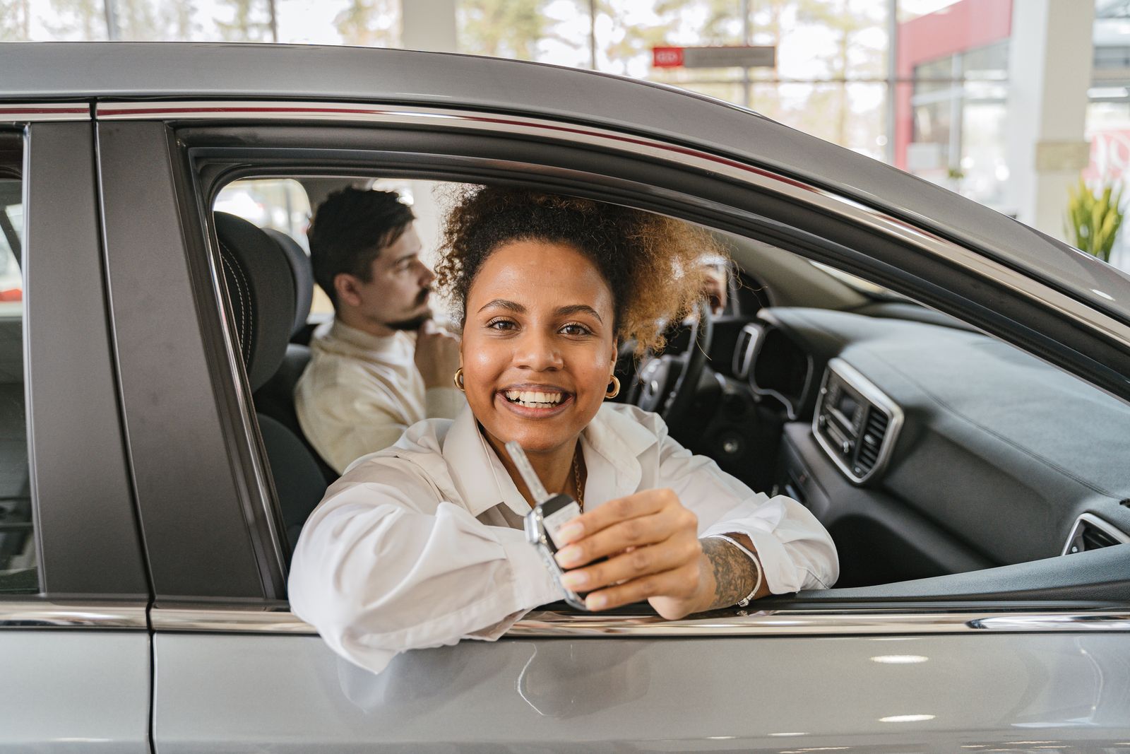 A customer receiving keys at handover